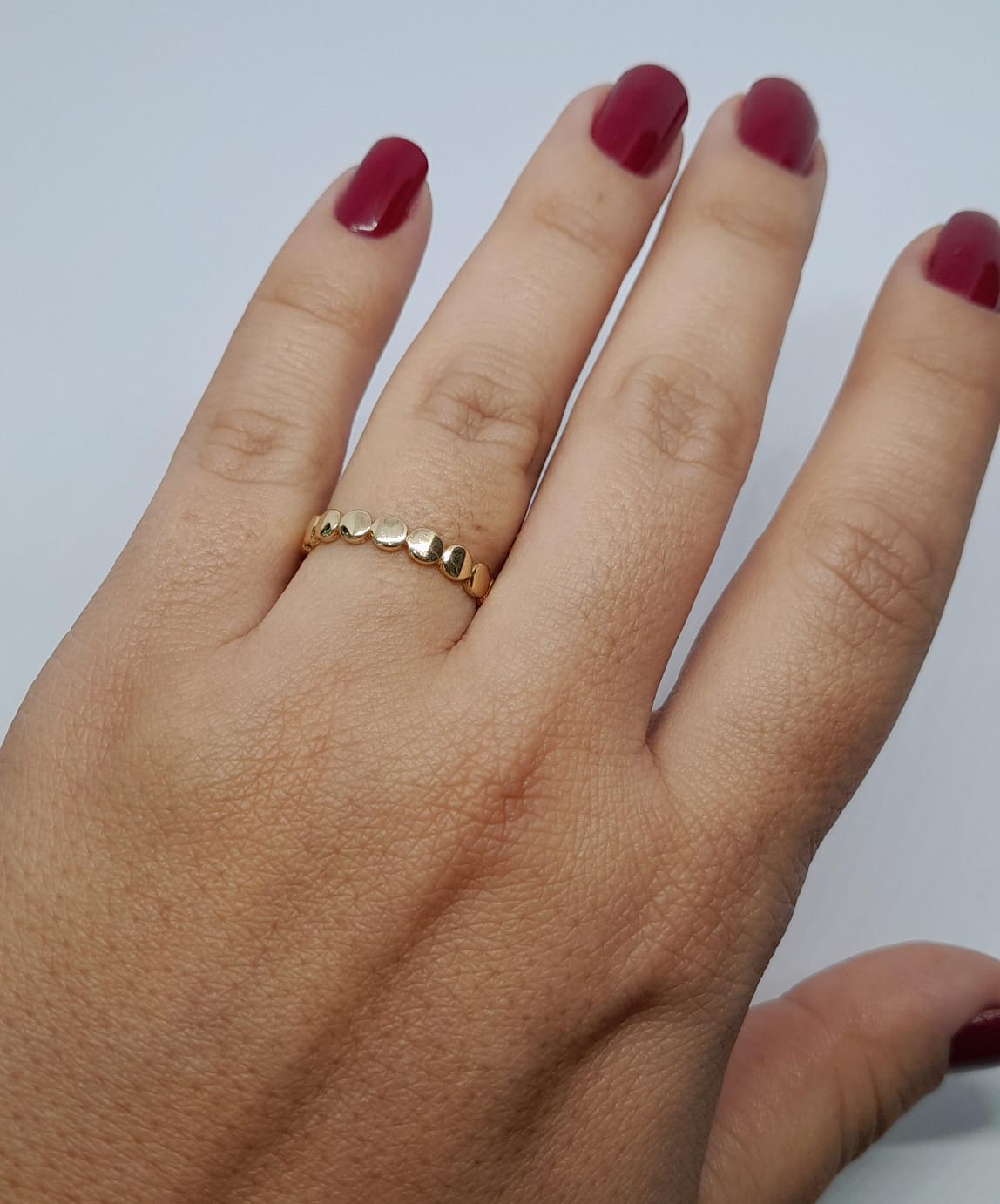 Anillo en oro laminado con Diseño de Esferas Seguidas ANW0782