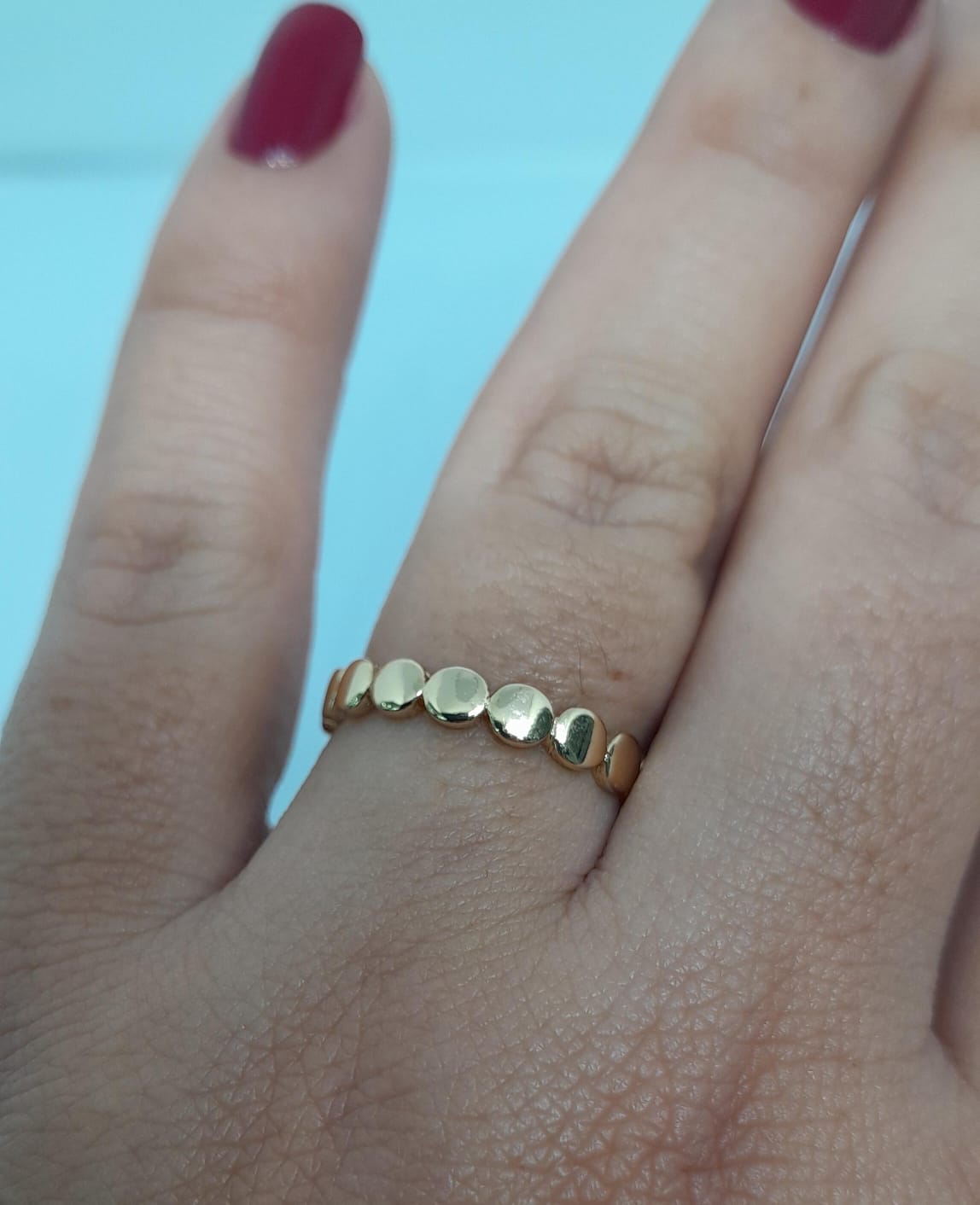 Anillo en oro laminado con Diseño de Esferas Seguidas ANW0782