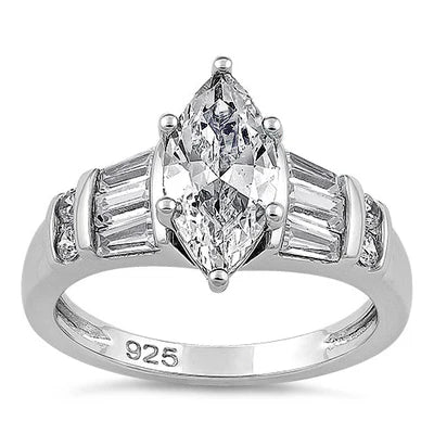 Anillo en plata con circon central corte marquise, laterales corte baguette y microcircones