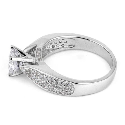ANILLO DE COMPROMISO EN PLATA CON CIRCON CENTRAL Y MICROCIRCONES EN LO LATERALES APCH58
