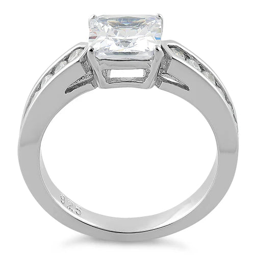 Anillo de plata con circon central talla princesa y microcircones laterales L19