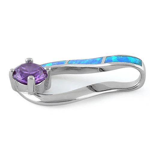 DIJE EN PLATA LEY 925 CON OPALO AZUL DE LABORATORIO Y CIRCON COLOR AMATISTA