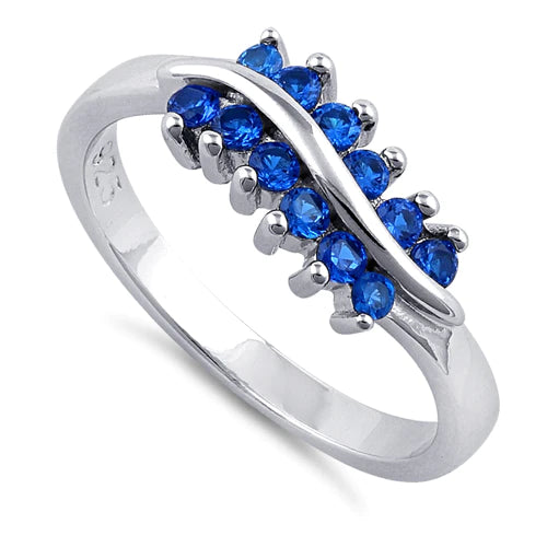 ANILLO EN PLATA CON ZAFIROS AZULES EN CURVA