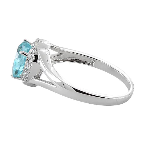 ANILLO EN PLATA CORAZON TOPACIO AZUL Y MICROCIRCONES ALREDEDOR APCH66