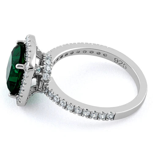 ANILLO EN PLATA LEY 925 CON ALMOHADON EN CIRCON VERDE ESMERALDA Y MICROCIRCONES ALREDEDOR