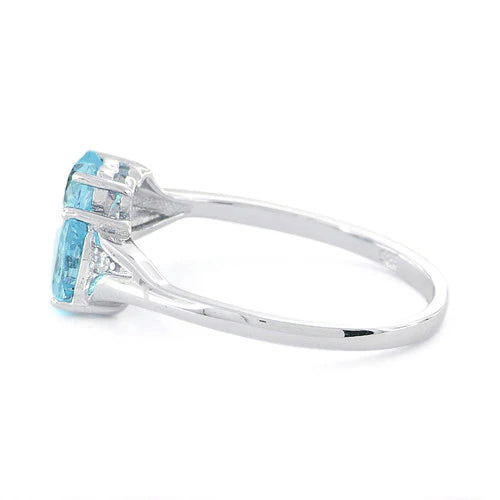 ANILLO EN PLATA DOBLE CORAZON TOPACIO AZUL