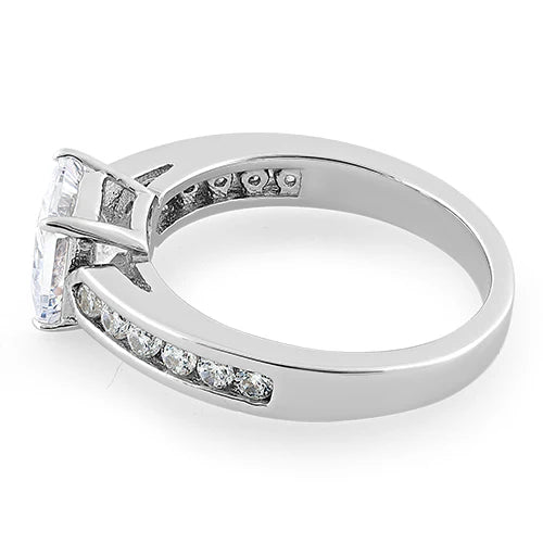 Anillo de plata con circon central talla princesa y microcircones laterales L19